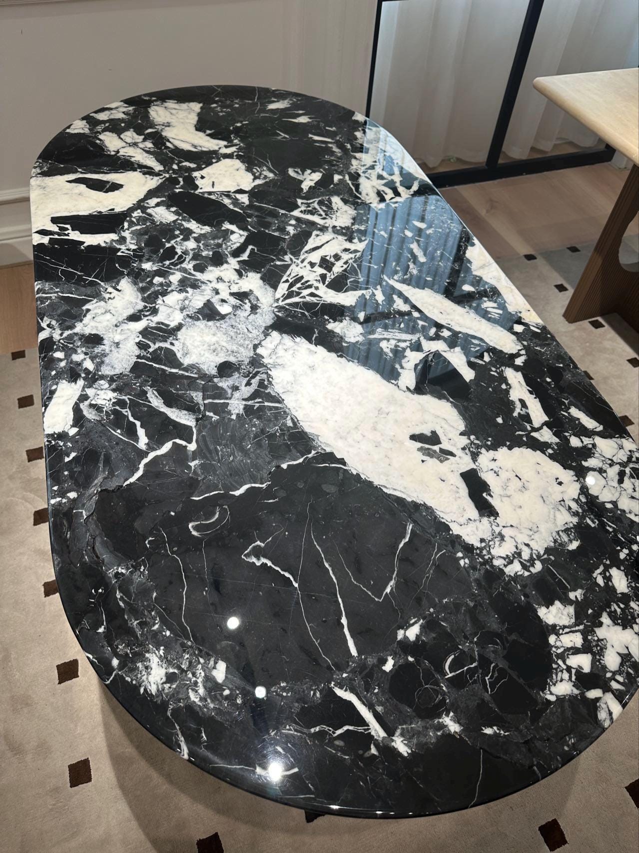 BORSCHELY Oval shape, Natural Carrara Black Marble Dining Table, timeless and classic beauty
