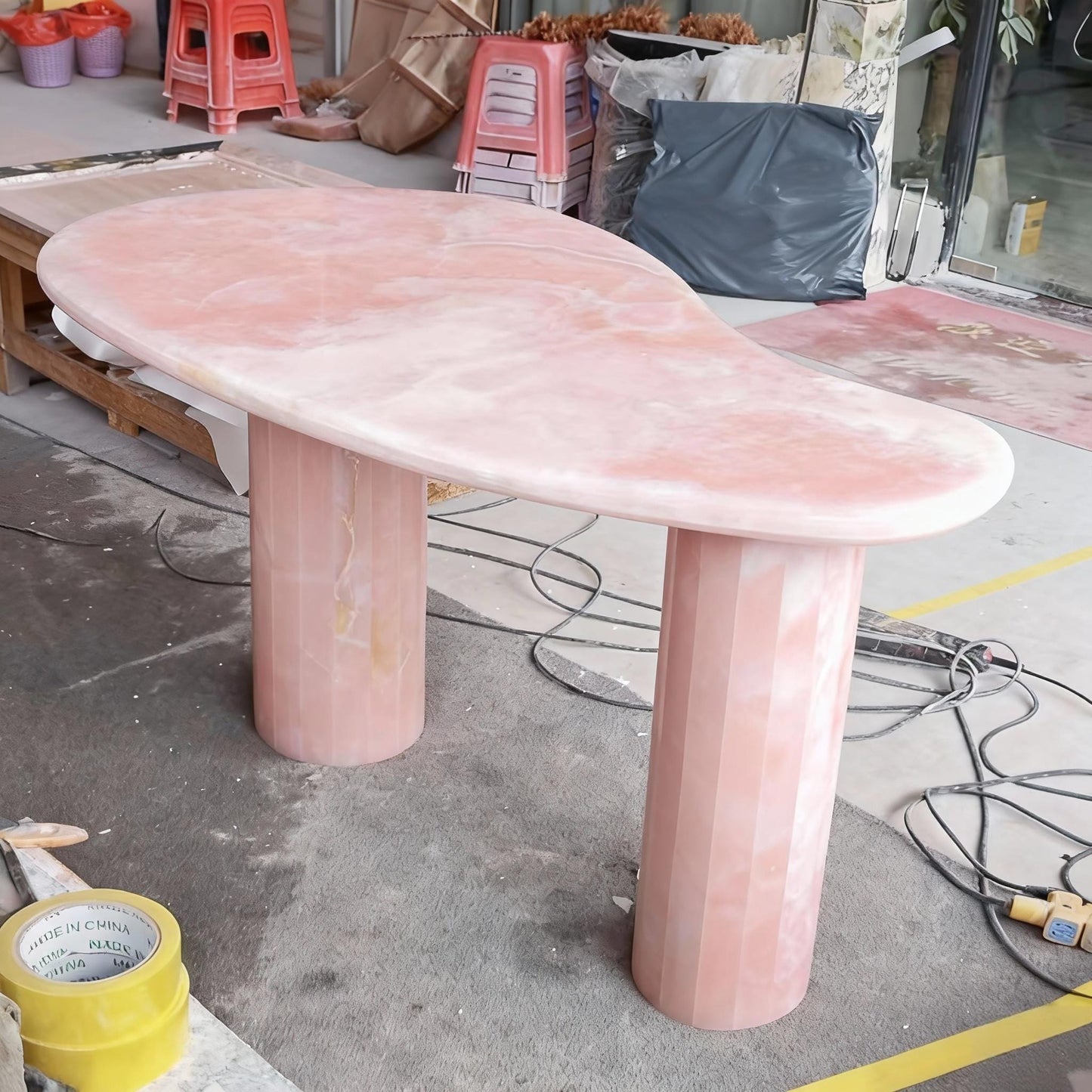 handmade elegant pink onyx desk table for lady boss  office space, mango shape, special interior design